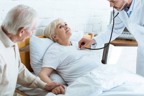 stock photo partial view doctor examining sick e1641886731798